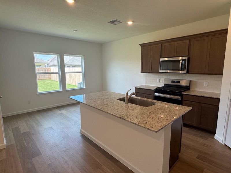 Furnished interior view inside a new home in Midtown Reserve, College Station (Image 7).