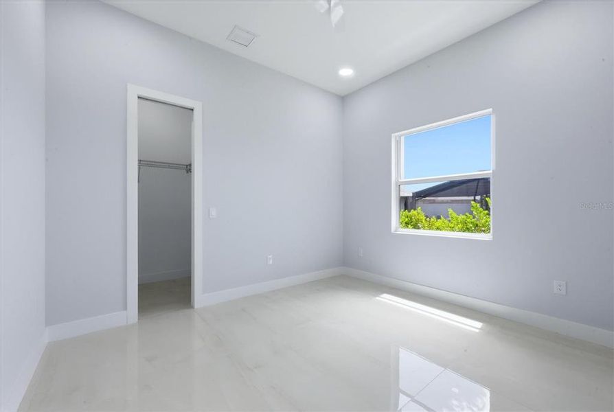 Spacious, unfurnished interior of a new home in , Port Charlotte (Image 30).