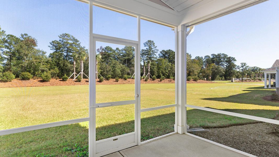 Exterior details and patio area of a home in Indigo Preserve, Leland (Image 21).
