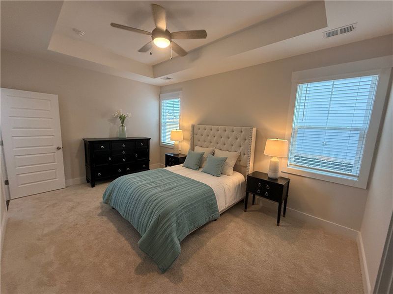 This inviting bedroom provides a comfortable retre