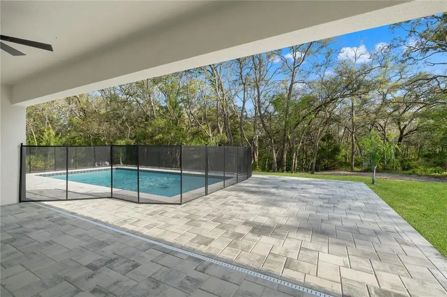 Exterior details and patio area of a home in , Weeki Wachee (Image 26).