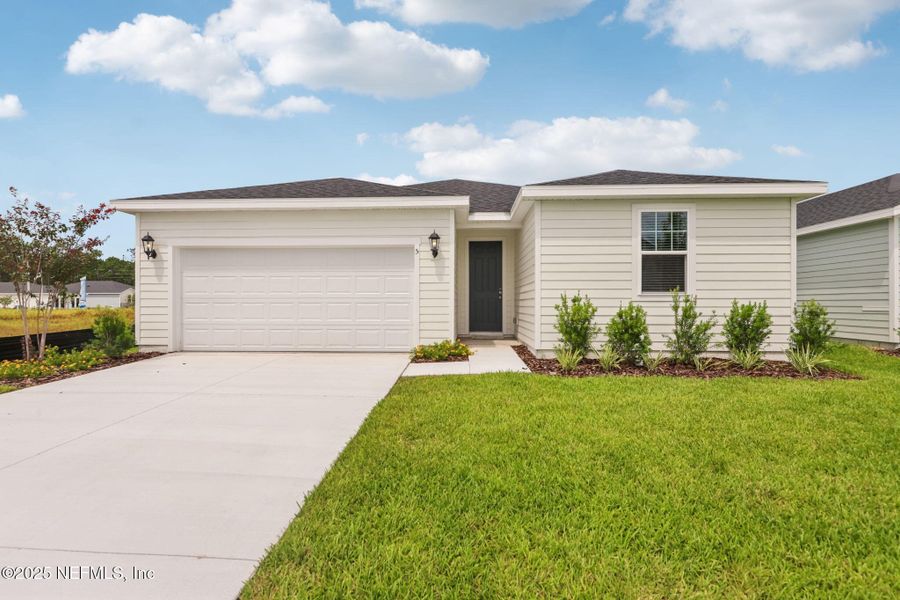 Front exterior of a new home in , Palm Coast, FL, highlighting curb appeal (Image 23).