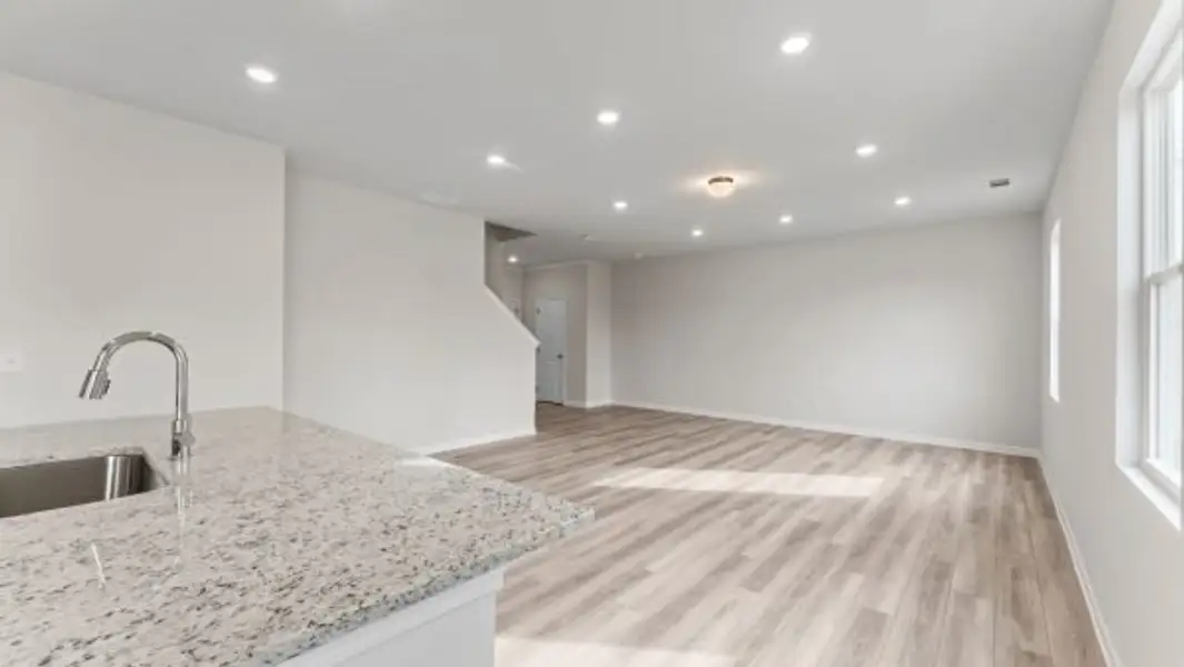 Representative unfurnished interior of a home built from the Bramblewood Townhome by Piedmont Residential in The Retreat at Browns Ridge, Newnan (Image 12).