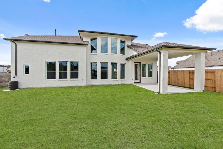 Front exterior of a new home in ARTAVIA® - 60', Conroe, TX, highlighting curb appeal (Image 16). Front exterior of a new home in ARTAVIA® - 60', Conroe, TX, highlighting curb appeal (Image 16).