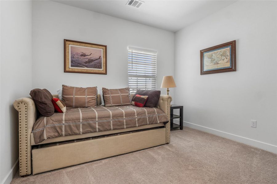 Bedroom 3 featuring carpet flooring and baseboards Bedroom 3 featuring carpet flooring and baseboards