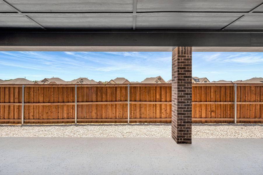 Exterior details and patio area of a home in Elements at Viridian - Garden Series, Arlington (Image 4). Exterior details and patio area of a home in Elements at Viridian - Garden Series, Arlington (Image 4).