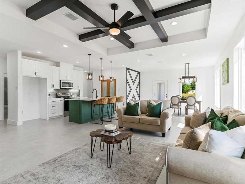 Living room with beamed ceiling, coffered ceiling, a ceiling fan, recessed lighting, and concrete flooring