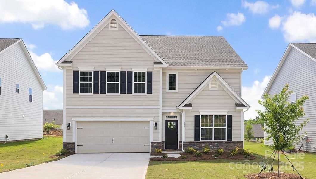 Front exterior of a new home in Falls Cove, Troutman, NC, highlighting curb appeal (Image 1).