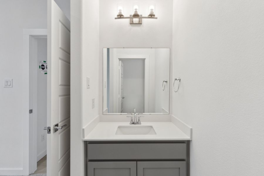 Bathroom in the Gilmour II home plan by Trophy Signature Homes – REPRESENTATIVE PHOTO