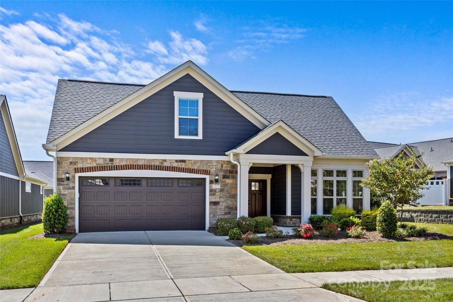 Front exterior of a new home in , Matthews, NC, highlighting curb appeal (Image 2). Front exterior of a new home in , Matthews, NC, highlighting curb appeal (Image 2).