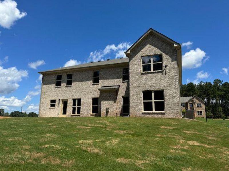 Front exterior of a new home in Underwood Crossing, Covington, GA, highlighting curb appeal (Image 15).