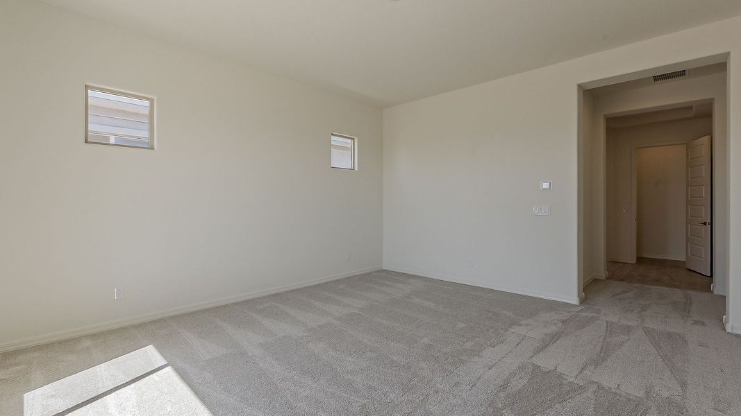 Furnished interior view inside a new home in Windrose, Waddell (Image 29).