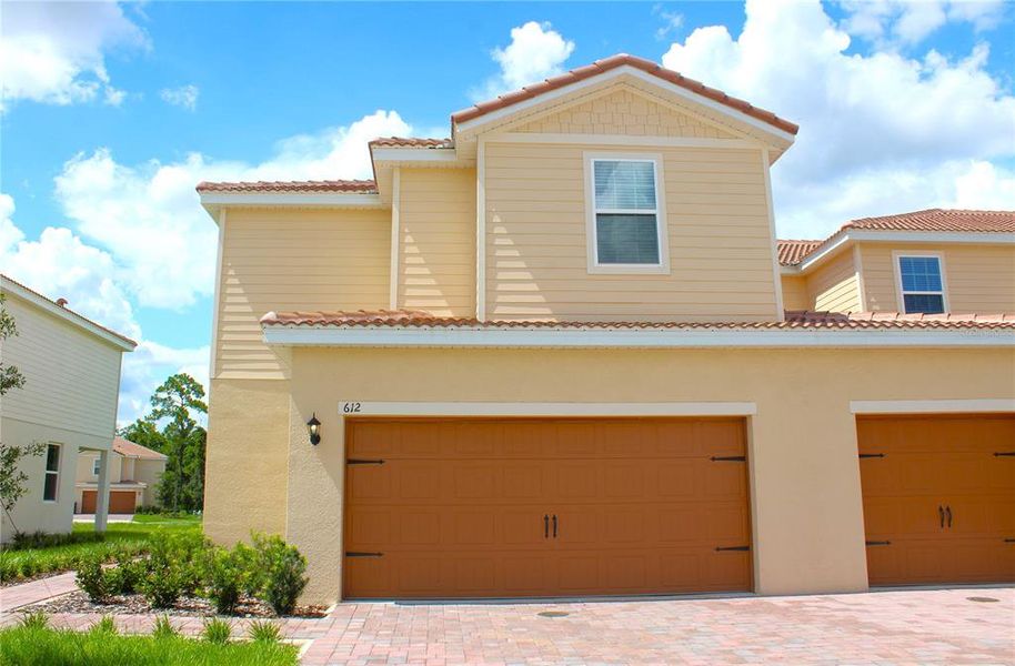 Exterior details and patio area of a home in Noah Estates at Tuscany Preserve, Poinciana (Image 1). Exterior details and patio area of a home in Noah Estates at Tuscany Preserve, Poinciana (Image 1).