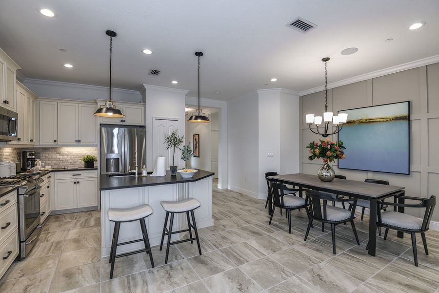Representative furnished interior of a home built from the Tidewater 2 by Neal Communities in Vicenza, Venice (Image 14).