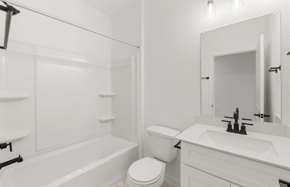 Furnished interior view inside a new home in Sunfield, Buda (Image 7).