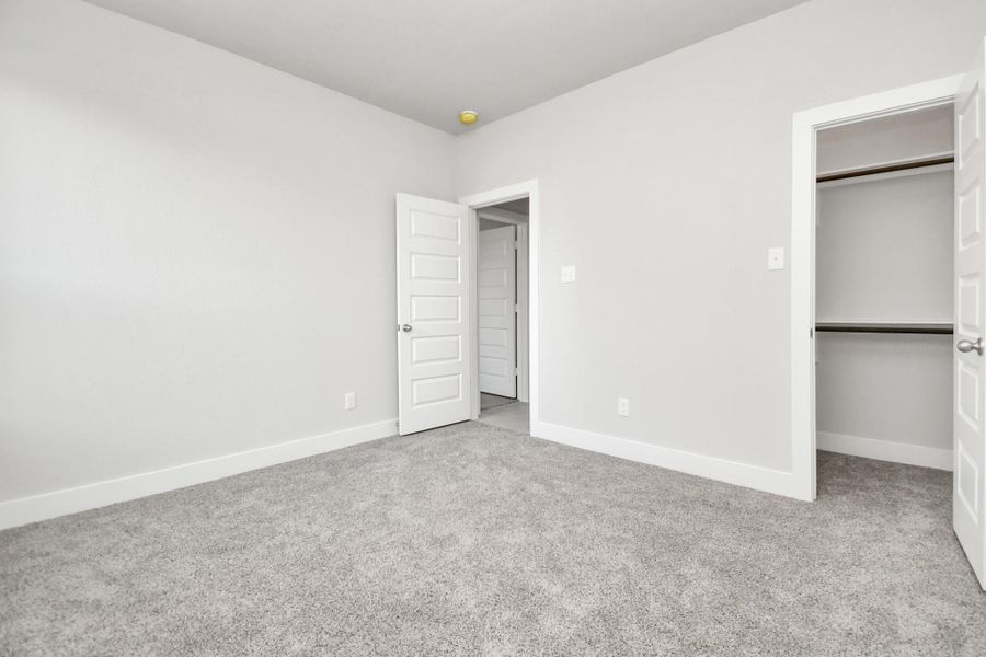 Example of completed home with similar plan. As-built colors and selections may vary.