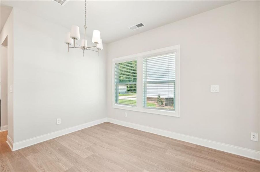 Spacious, unfurnished interior of a new home in Hemingway - Cottage Series, Cumming (Image 18). Spacious, unfurnished interior of a new home in Hemingway - Cottage Series, Cumming (Image 18).