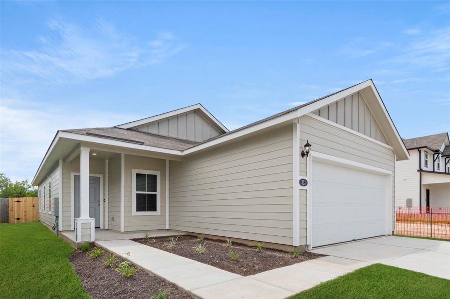 Ranch-style home with board and batten siding, driveway, an attached garage, and roof with shingles Ranch-style home with board and batten siding, driveway, an attached garage, and roof with shingles