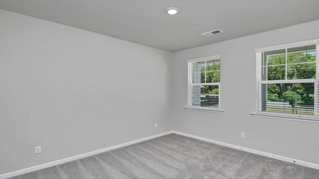 Spacious, unfurnished interior of a new home in Sease's Pond, Gilbert (Image 15).