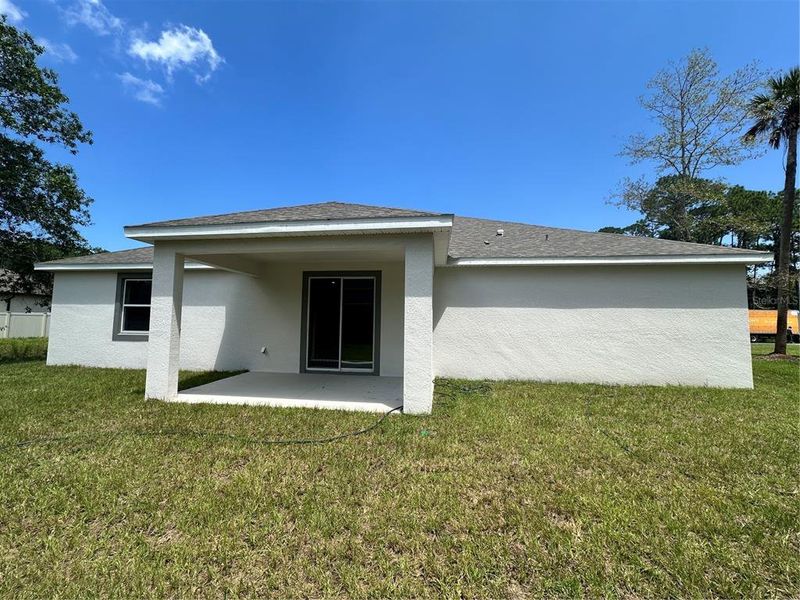 Exterior details and patio area of a home in Palm Coast: Value Collection, Palm Coast (Image 3).