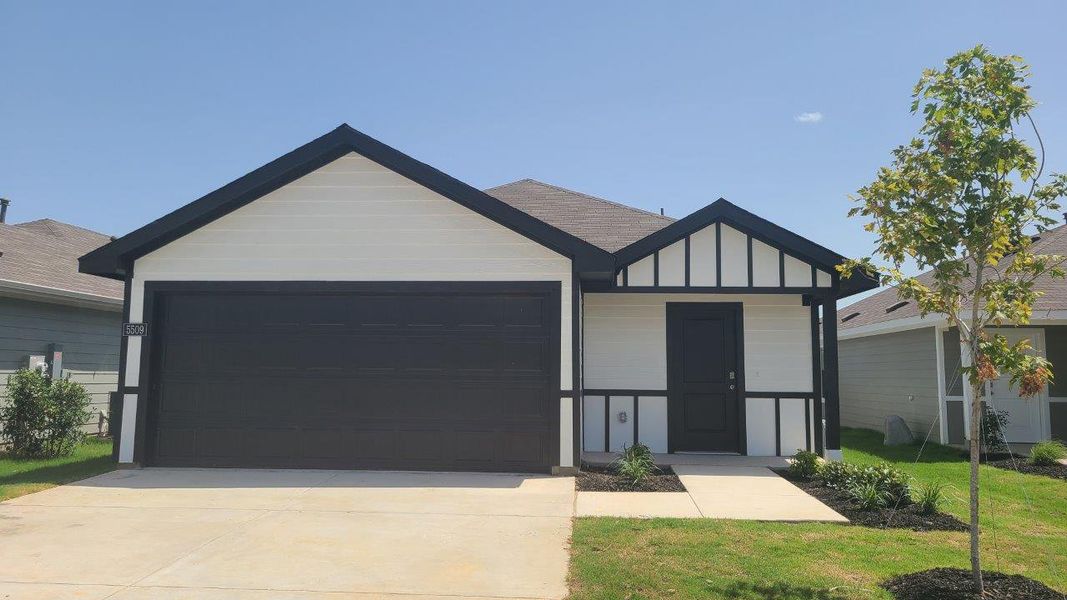 Front exterior of a new home in Hickory Grove, Krum, TX, highlighting curb appeal (Image 1). Front exterior of a new home in Hickory Grove, Krum, TX, highlighting curb appeal (Image 1).