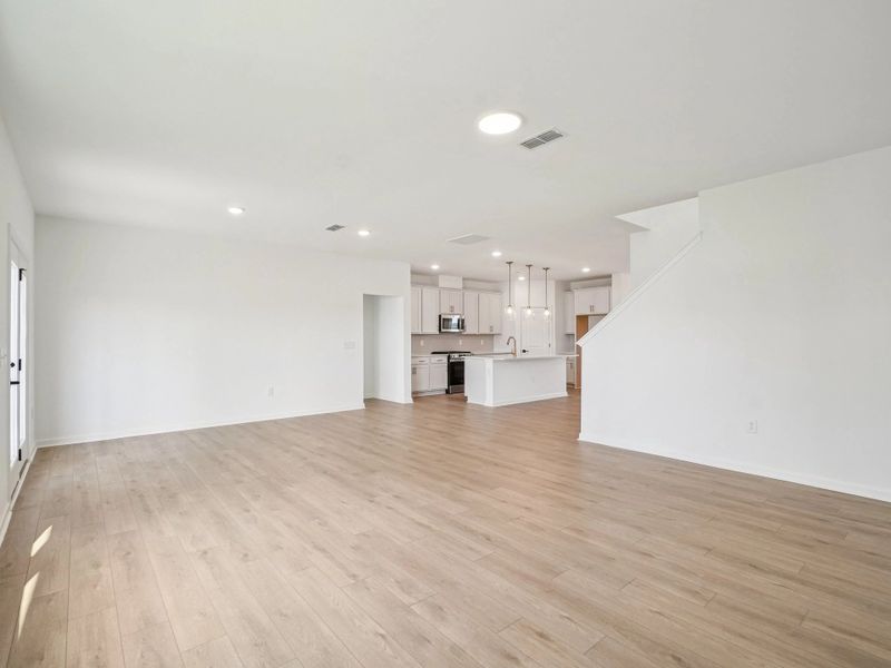 Family Room featuring the AW Collection® Serene - Open space with natural finishes and light.