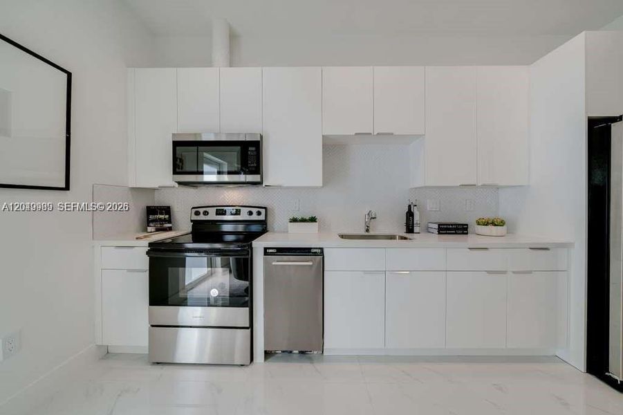 Furnished interior view inside a new home in , Miami (Image 7). Furnished interior view inside a new home in , Miami (Image 7).