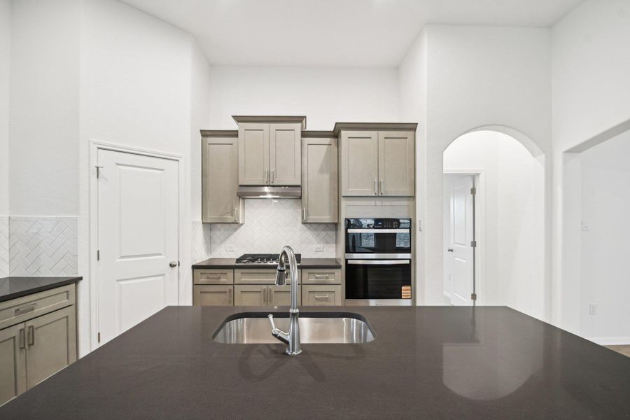 Furnished interior view inside a new home in Crosswinds, Kyle (Image 9).