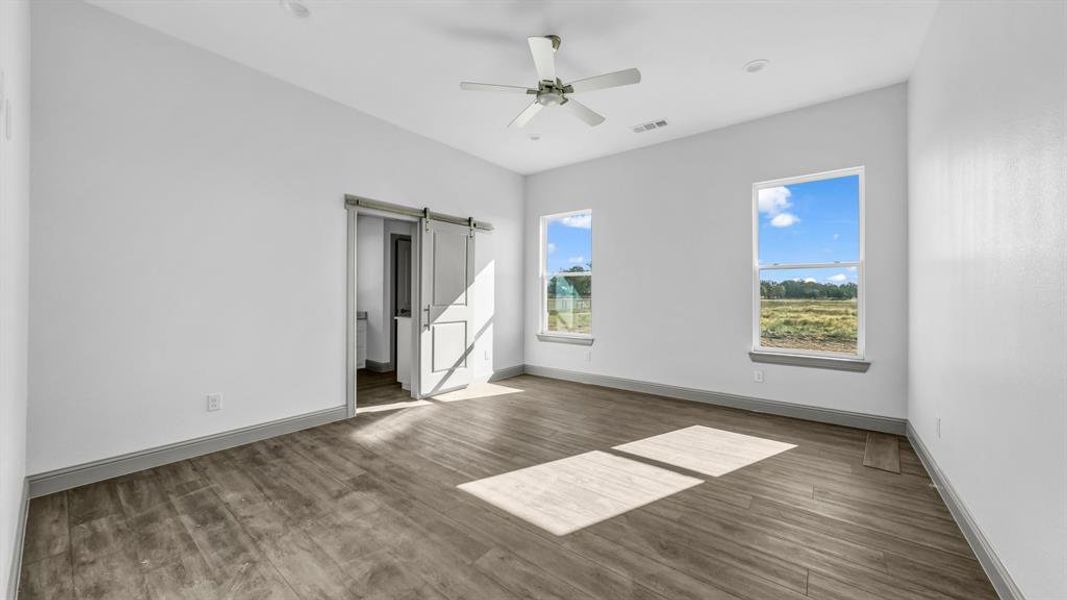 Master bedroom with optional barn door to the master bath.