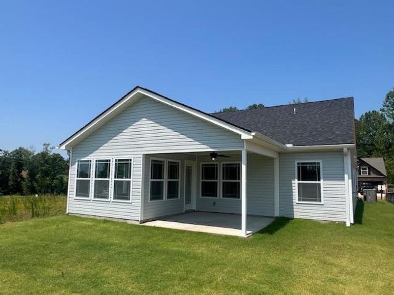 Front exterior of a new home in Cleveland Meadows, Spartanburg, SC, highlighting curb appeal (Image 15).