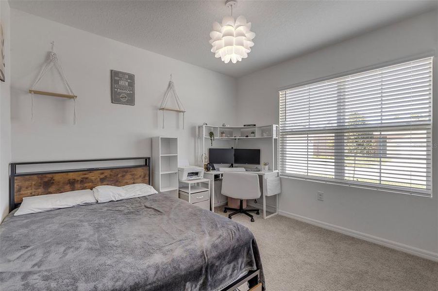 Furnished interior view inside a new home in Groveside at Ormond Station, Ormond Beach (Image 6).