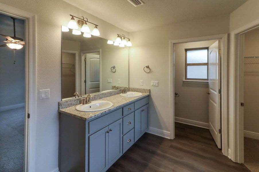 Representative furnished interior of a home built from the Plan 3044 by Adams Homes in Cedar Creek at Deerpoint Lake, Panama City (Image 9).