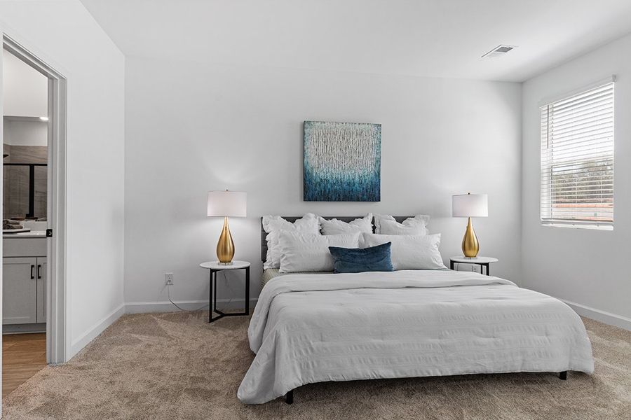 A bed in a room. A bed in a room.