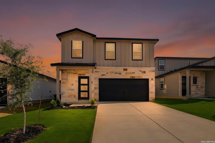 Front exterior of a new home in Agave, San Antonio, TX, highlighting curb appeal (Image 23). Front exterior of a new home in Agave, San Antonio, TX, highlighting curb appeal (Image 23).
