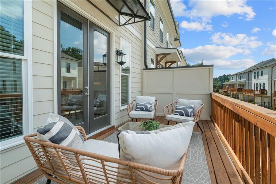 Exterior details and patio area of a home in Evanshire Single Family, Duluth (Image 4).