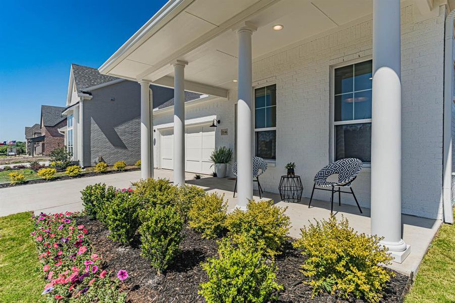 Lovely front porch to use and enjoy when visiting with neighbors. Lovely front porch to use and enjoy when visiting with neighbors.