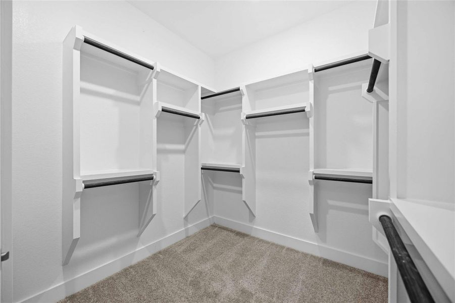 Furnished interior view inside a new home in Ellwood, Iowa Colony (Image 13).