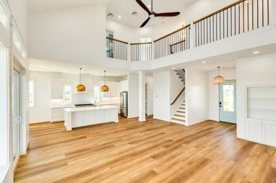 Large living space Den to kitchen