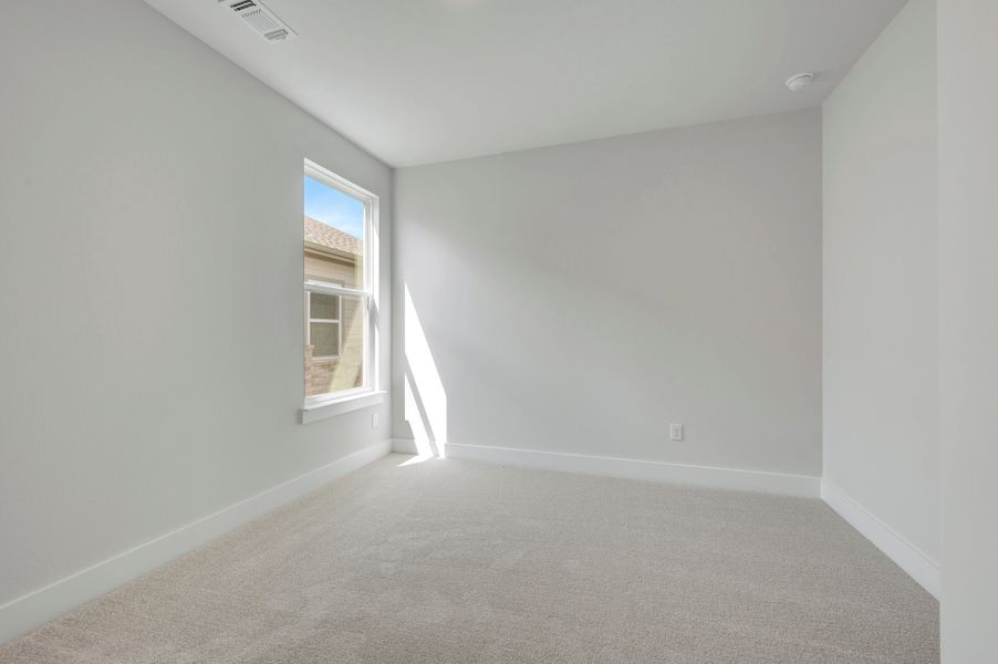 Spacious, unfurnished interior of a new home in The Meadows, Denton (Image 24).