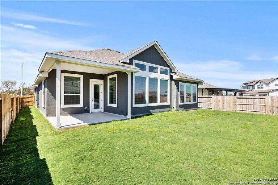 Exterior details and patio area of a home in Village at Three Oaks, Seguin (Image 3). Exterior details and patio area of a home in Village at Three Oaks, Seguin (Image 3).
