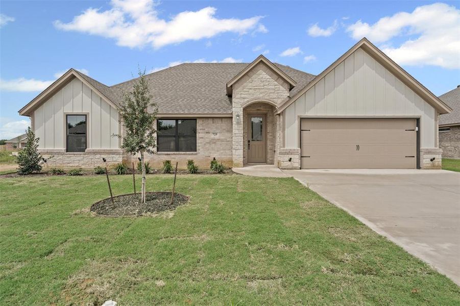 Front exterior of a new home in , Springtown, TX, highlighting curb appeal (Image 20). Front exterior of a new home in , Springtown, TX, highlighting curb appeal (Image 20).