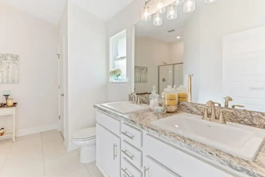 Representative furnished interior of a home built from the 1820 by Adams Homes in Flagler Estates, Hastings (Image 44).