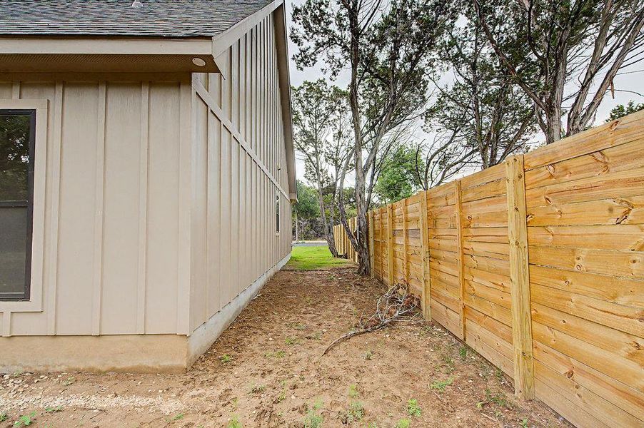 Exterior details and patio area of a home in , Wimberley (Image 25).