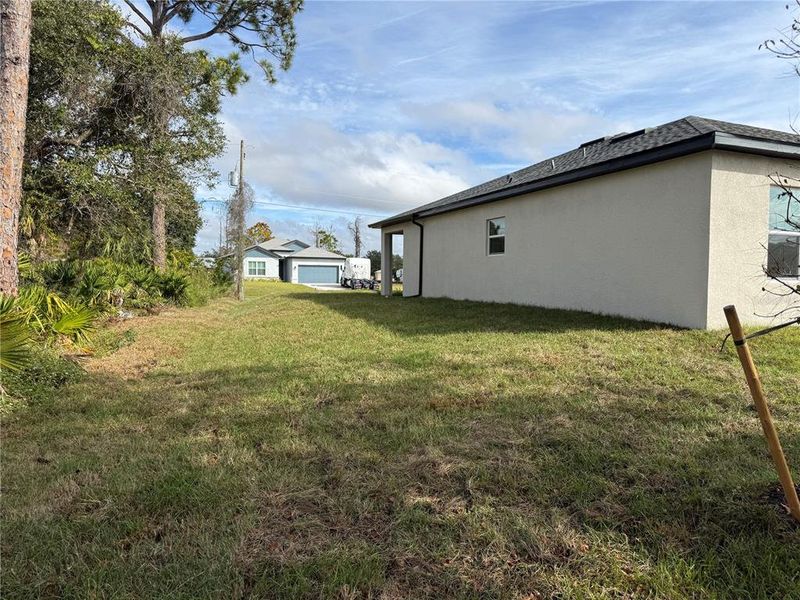 Exterior details and patio area of a home in , North Port (Image 24).