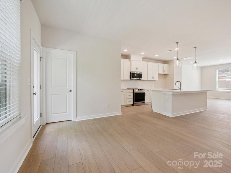 Spacious, unfurnished interior of a new home in Central Living at Craig, Charlotte (Image 26).