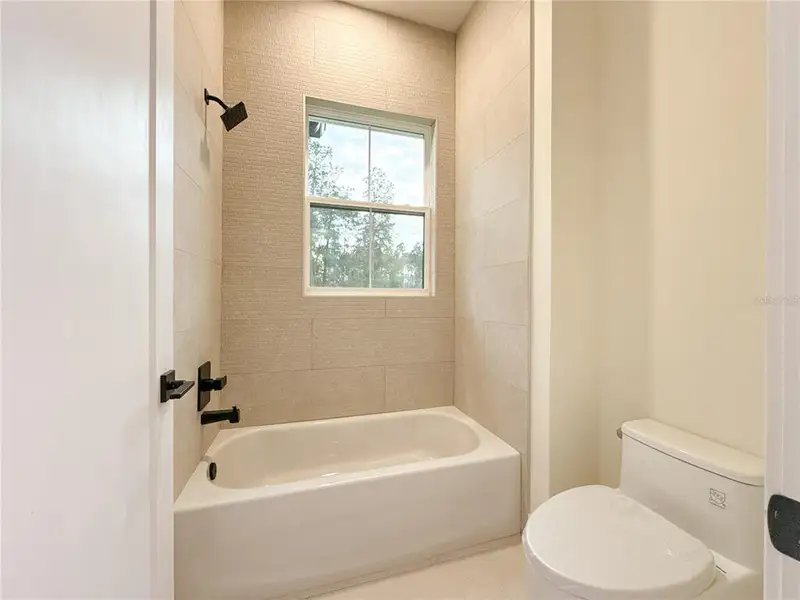 Furnished interior view inside a new home in , Dunnellon (Image 5).