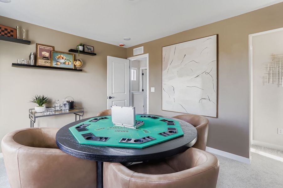 Furnished interior view inside a new home in Barefoot, Firestone (Image 6).