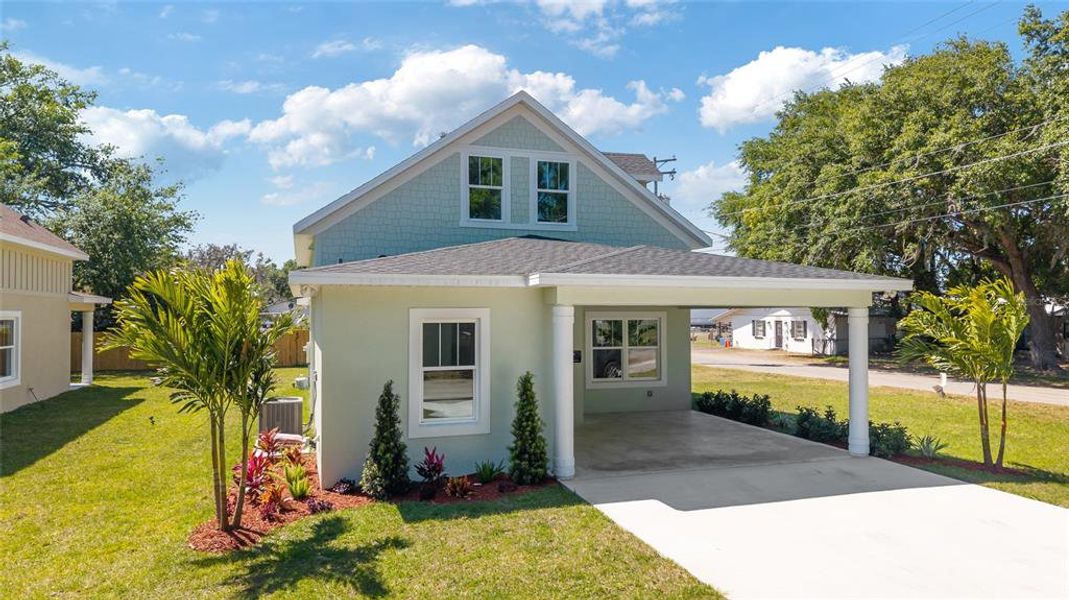 Front exterior of a new home in , Plant City, FL, highlighting curb appeal (Image 2).