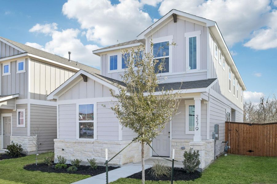 Front exterior of a new home in Avery Centre, Round Rock, TX, highlighting curb appeal (Image 2). Front exterior of a new home in Avery Centre, Round Rock, TX, highlighting curb appeal (Image 2).