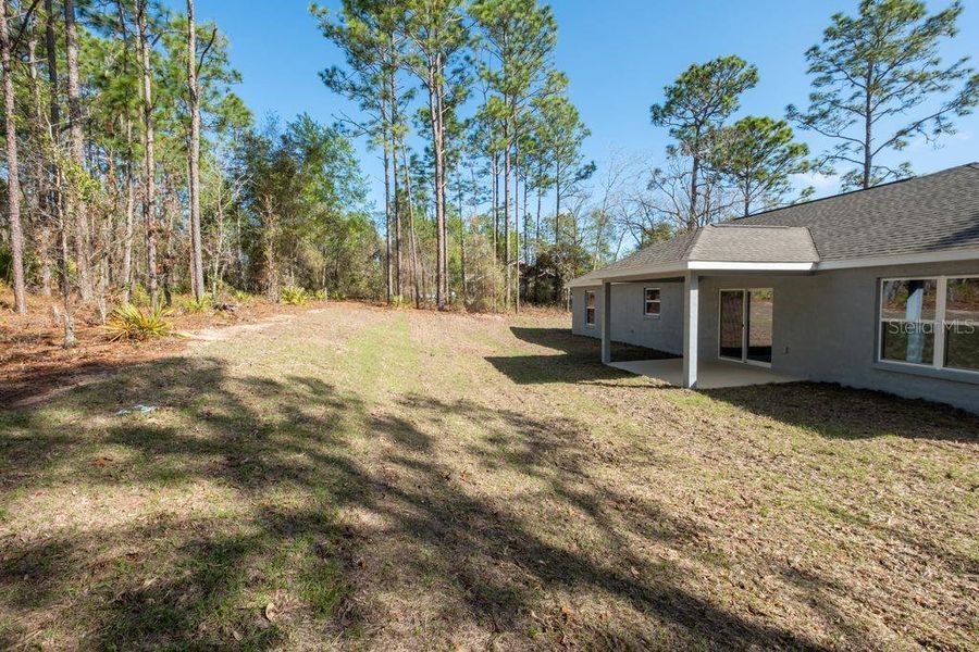 Exterior details and patio area of a home in , Citrus Springs (Image 23).
